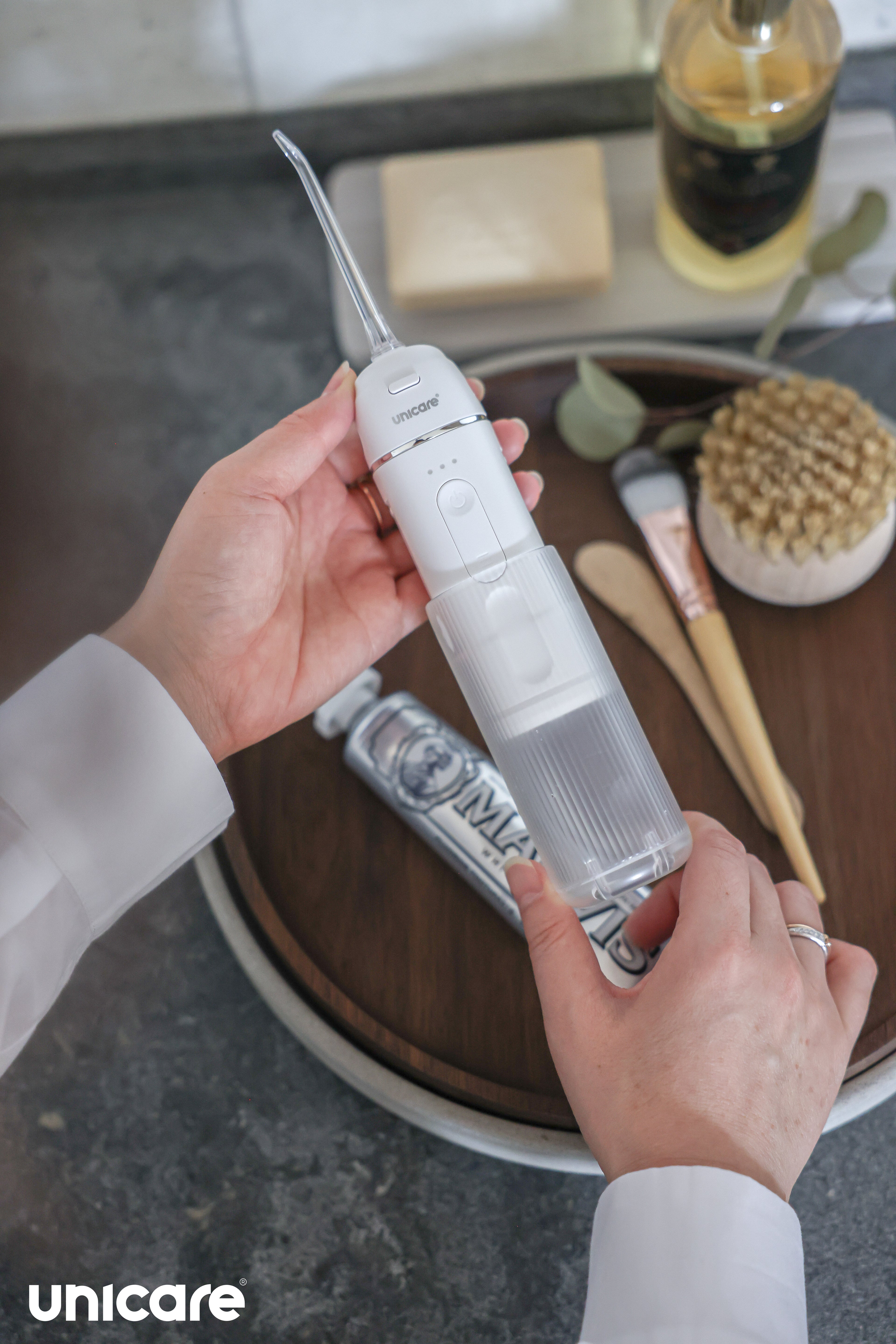 unicare®mini口袋型高效電動沖牙機(三色)